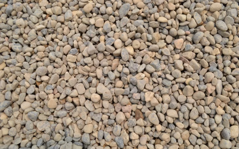 Pea Stone Screening with DeSite Topsoil and Rock Screeners - Guide to Choosing the Right Mesh Size for Efficient Screening.